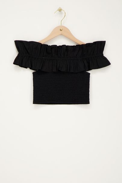 Top noir à smocks et volants