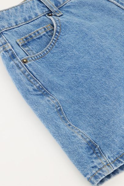 Blue denim shorts with wave