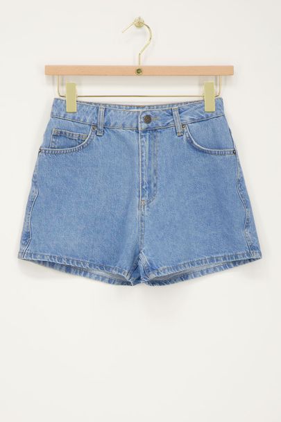 Blue denim shorts with wave