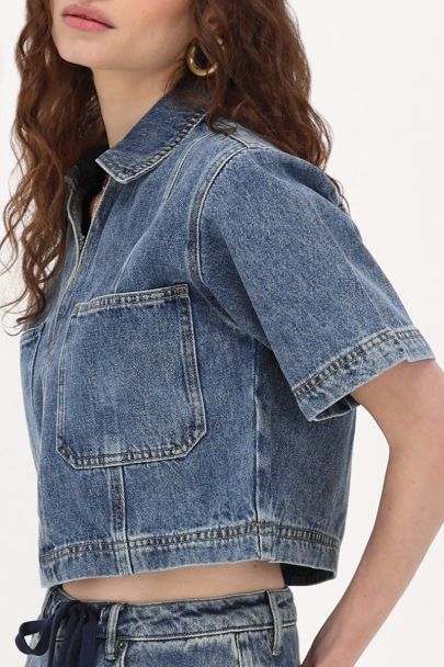 Blauwe denim top met V-hals