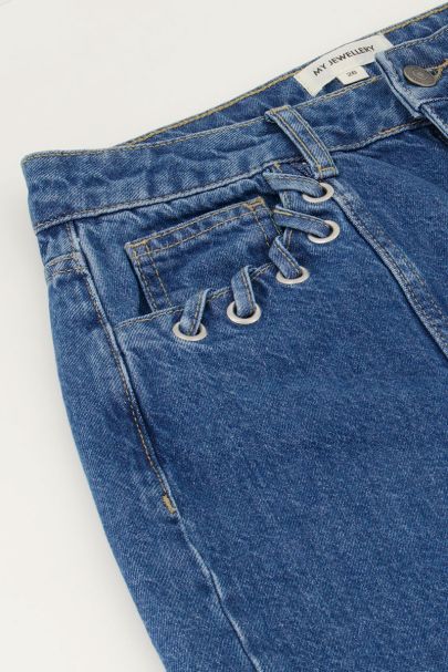 Donkerblauwe wide leg jeans met eyelets