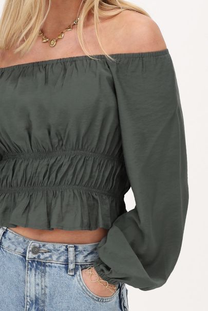 Donkergroene off shoulder top met ruffles