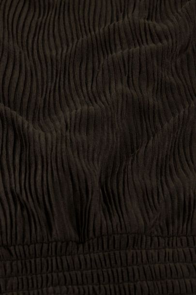 Dark green pleated top with knot