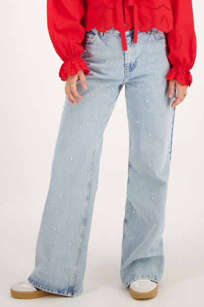 Denim jeans with faux pearls