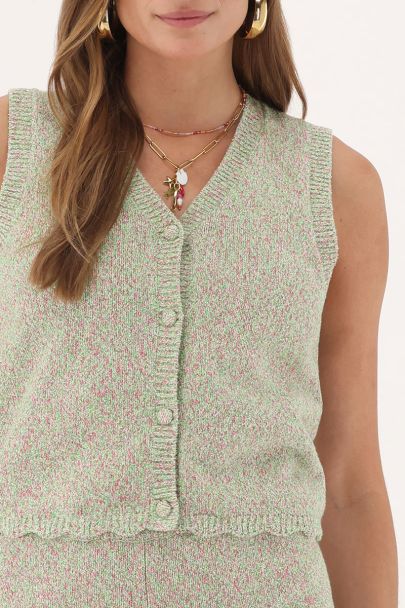 Groen gilet met geschulpte rand