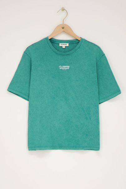 Green T-shirt sports and patches