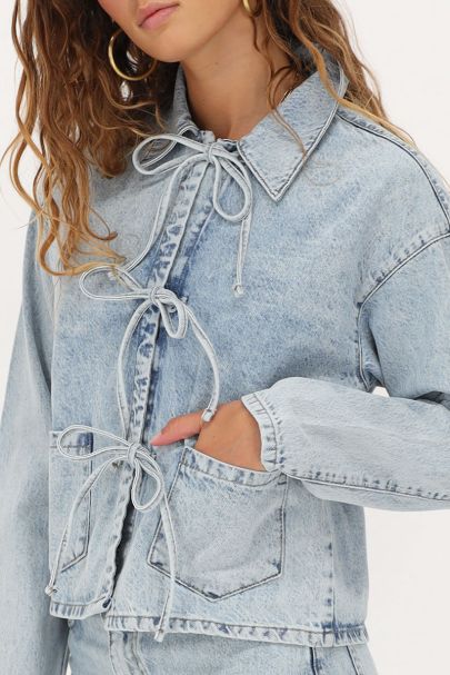 Light blue denim jacket with bows