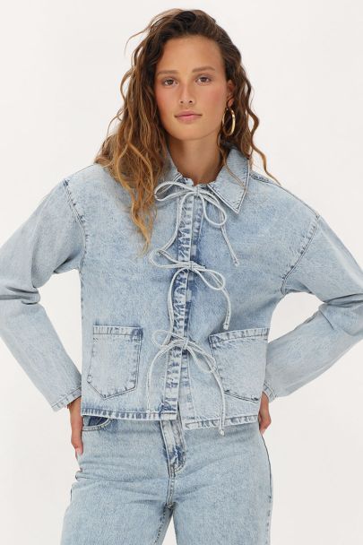 Light blue denim jacket with bows