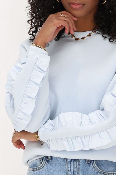 Lichtblauw geweven sweater met ruffle
