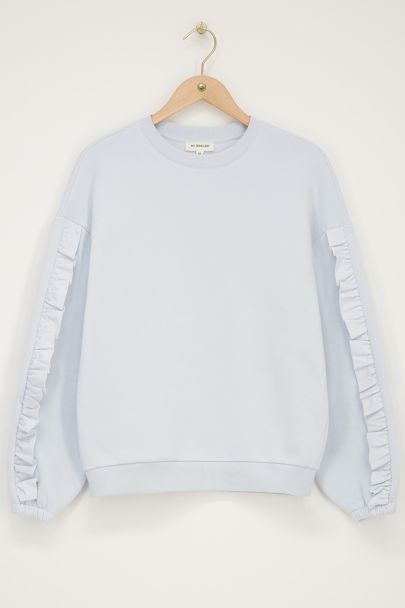 Lichtblauw geweven sweater met ruffle