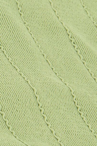 Groen bikini broekje met rib en ruffle