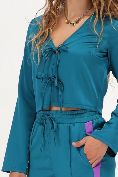 Petrol satijnen top met strikjes