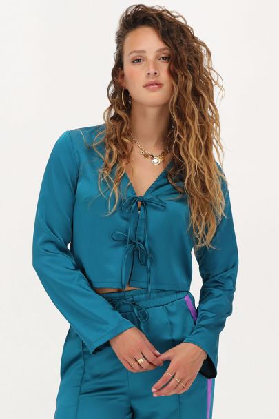 Petrol satijnen top met strikjes