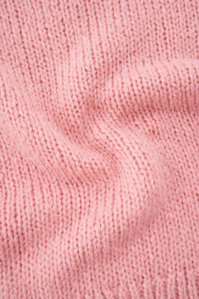 Light pink knitted sweater with short sleeves
