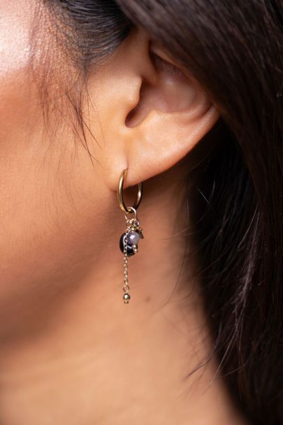 Boucles d’oreilles avec deux pierres et une étoile