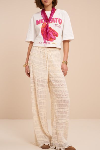 White wide leg trousers with ruffles
