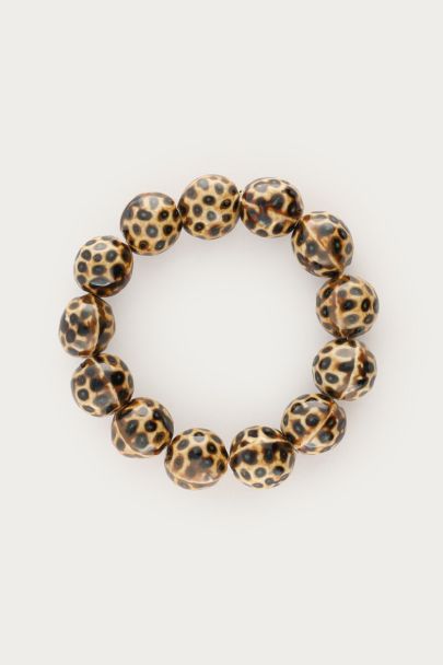 Beige armband met panterprint kralen