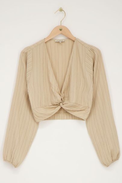 Top court beige avec boutons 