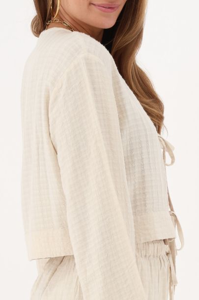 Beige jacquard top met strik details