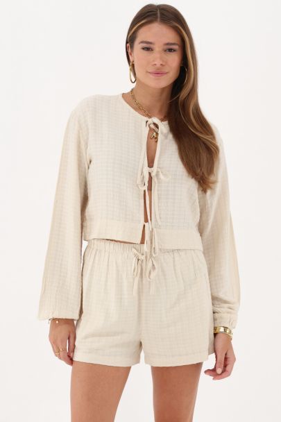 Beige jacquard top met strik details