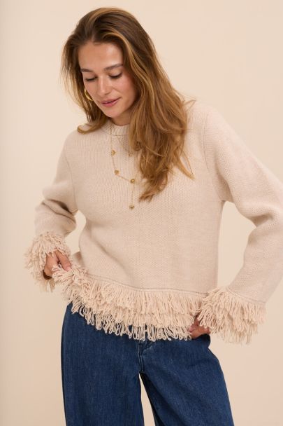 Beigefarbener Strickpullover mit Fransen