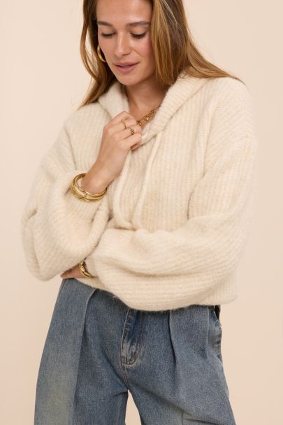 Beige oversized knitted sweater with hood
