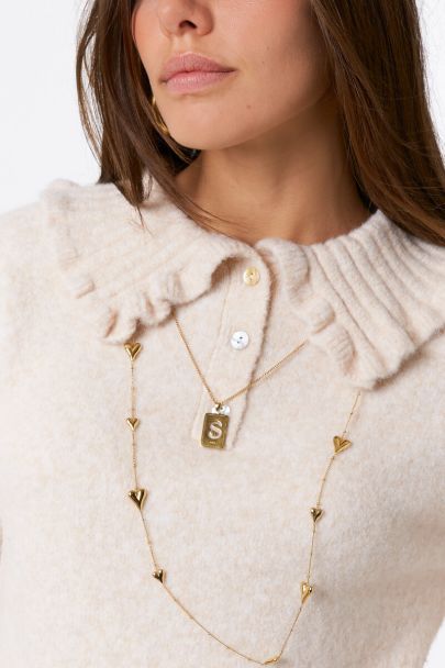 Beige polo sweater with ruffle collar