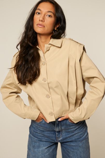 Beige short trench coat with pleats