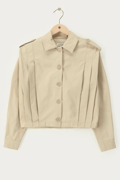 Trench-coat court beige avec plis