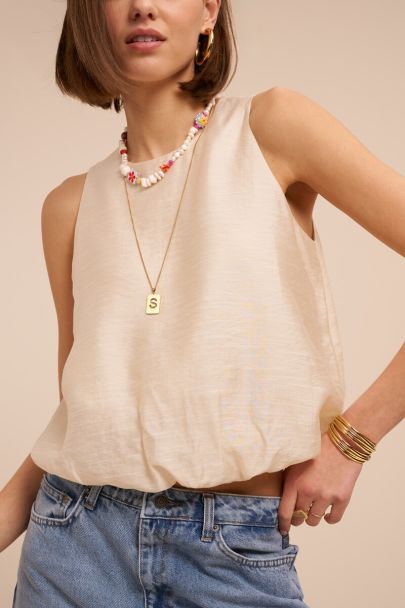 Beige mouwloze top in ballon look