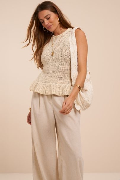 Beige tape-yarn top with peplum