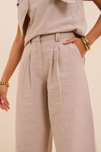 Pantalon beige large aspect lin 