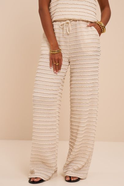 Beige wijde broek met elastische band en structuur