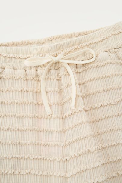 Beige wide leg trousers with elastic waistband and structure