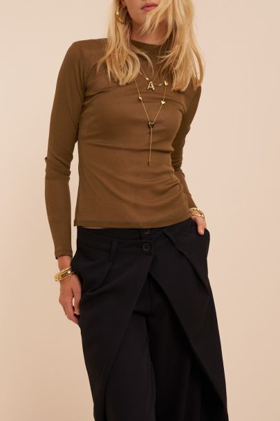 Black barrel trousers with double fastening