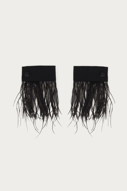 Black cuffs with feathers