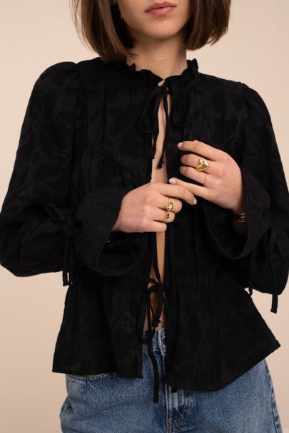 Zwarte jacquard top met strikjes en ruffle mouwen