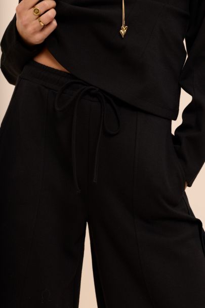 Black jogger trousers with tie drawstring