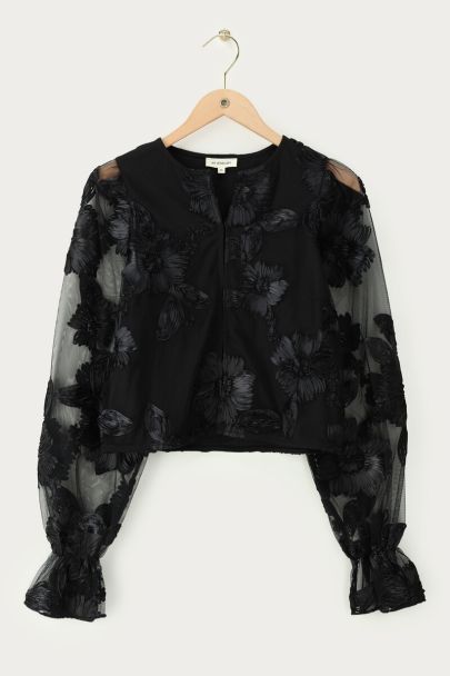 Schwarzes Mesh-Oberteil mit Blumen und Manschette