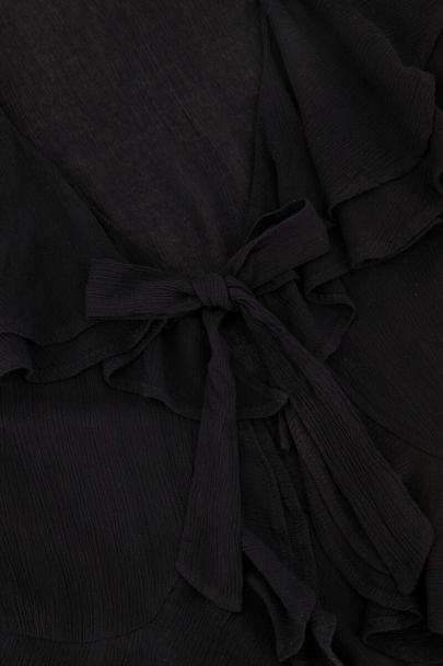 Schwarzes Rüschenoberteil mit Schleife