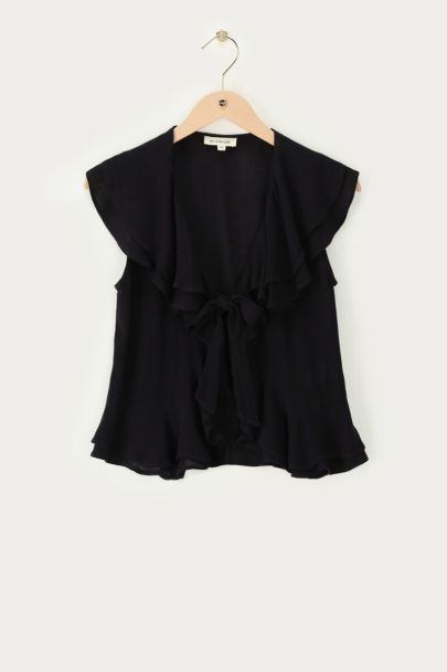 Black ruffle top with bow