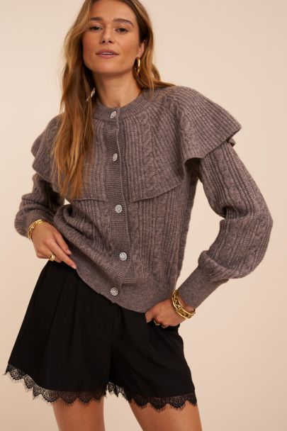 Black shorts with pleats and lace trim