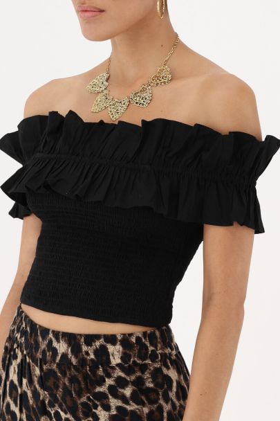 Zwarte gesmokte top met ruffles
