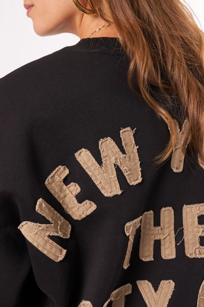 Zwarte sweater "City of dreams"