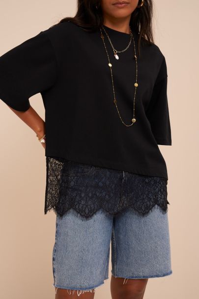 Zwart T-shirt met schuin kant details