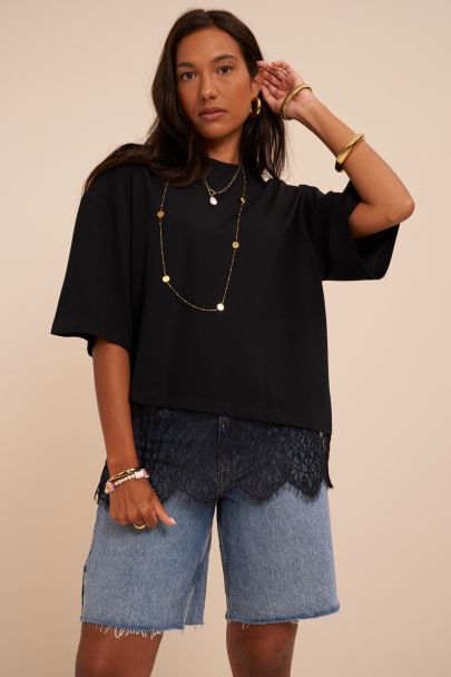 Zwart T-shirt met schuin kant details