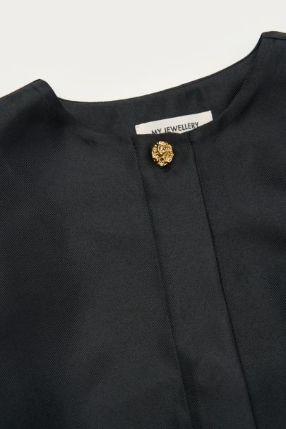 Zwarte top met pofmouwen en knopen