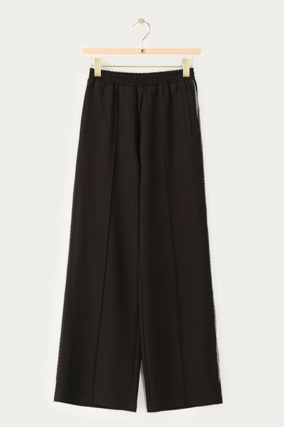 Zwarte wide leg broek met ballchain