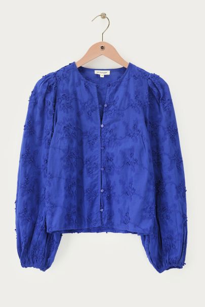 Blaue Bluse mit Trompetenärmeln und 3D-Blumen