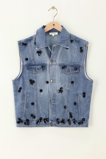 Blue denim vest with floral sequins